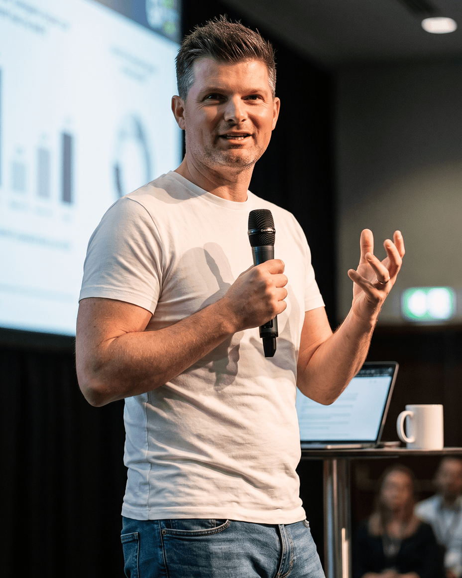 Stuart McLeod, founder of McLeod Media, presenting on stage